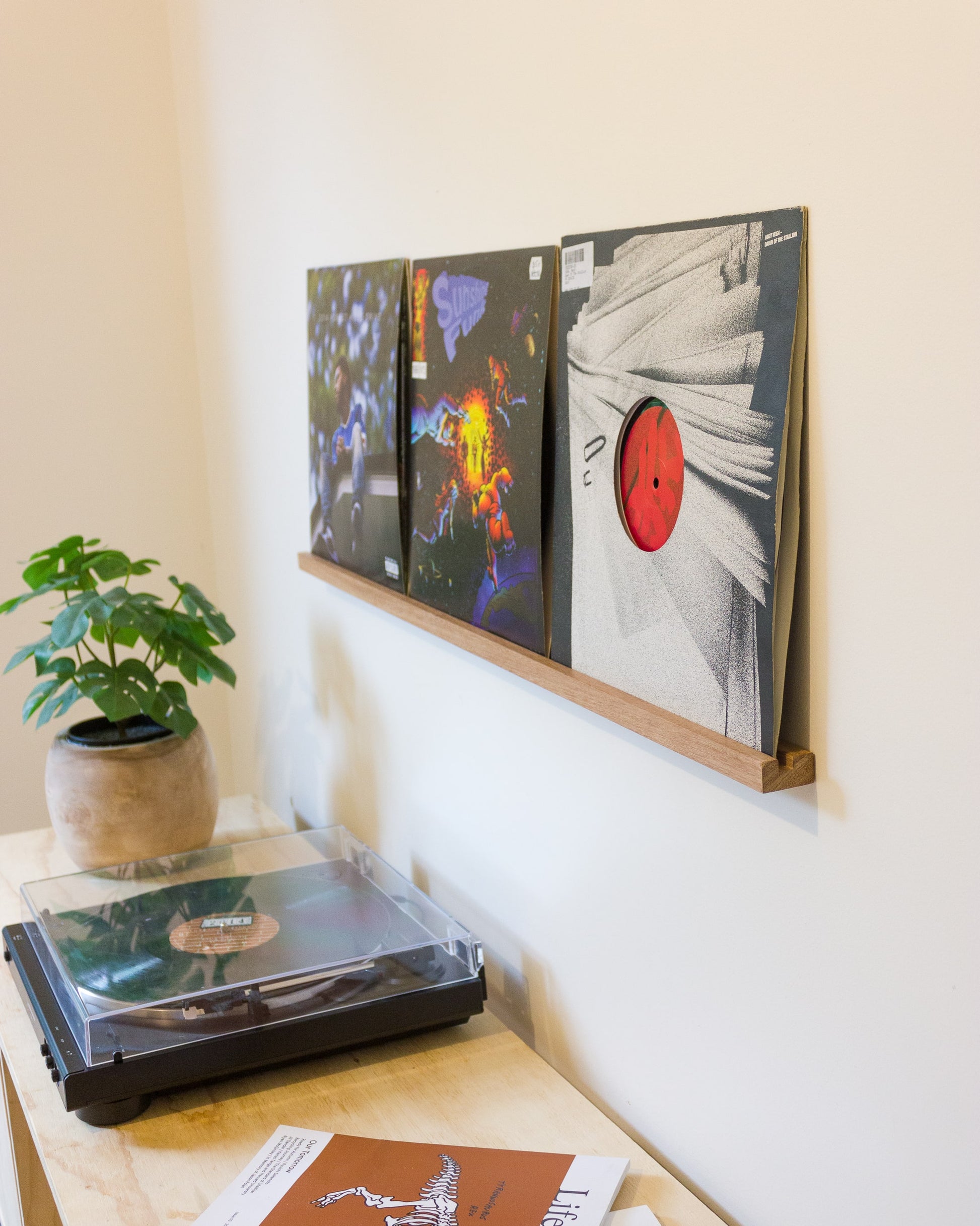 This is an excellent gift for a musician or any music lover. Our floating vinyl record display shelves are made from ECO-Sustainable solid wood, giving them a sleek, natural look.